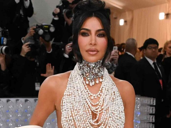 Dripping In Pearls Kim Kardashian Dons A Schiaparelli Nude Dress At