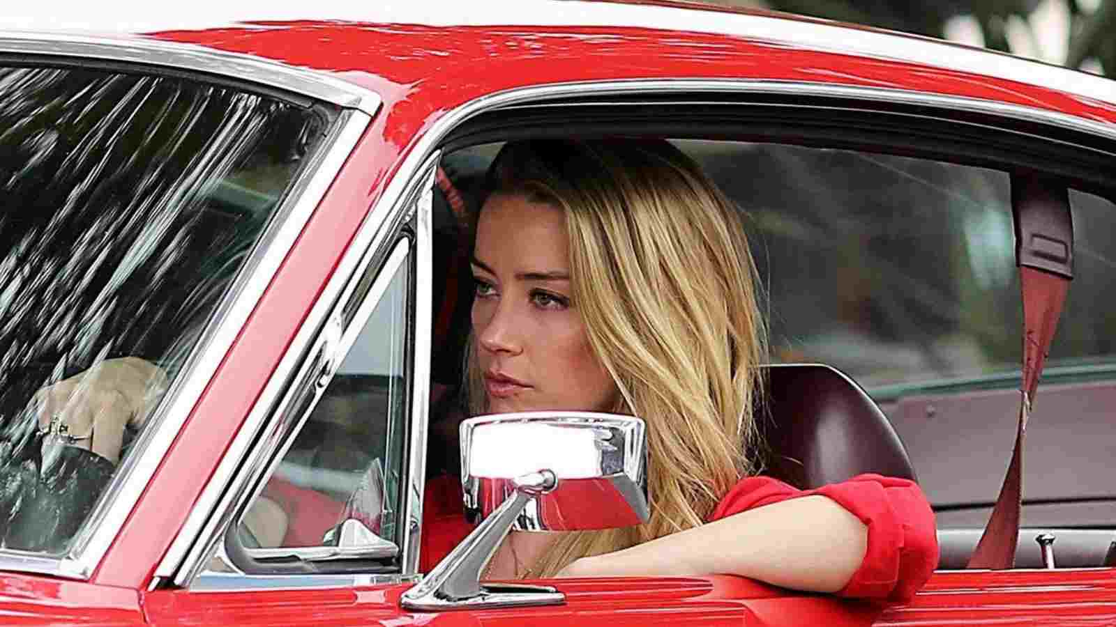Amber heard with her Mustang