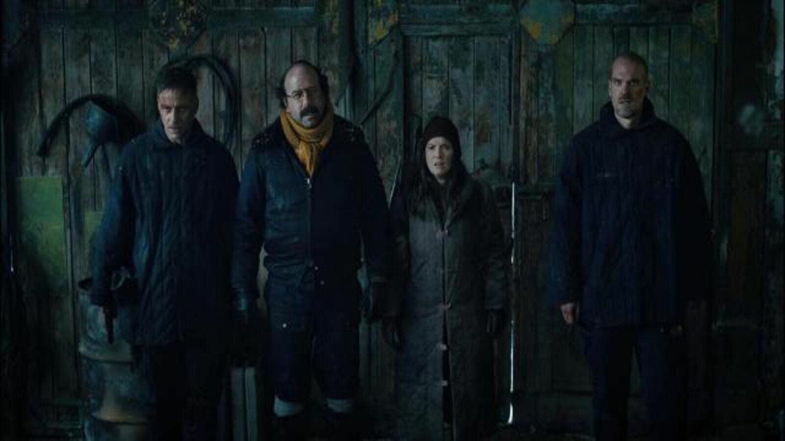 Hopper, Joyce, Murray, and their jail guard-turned-friend Dmitri