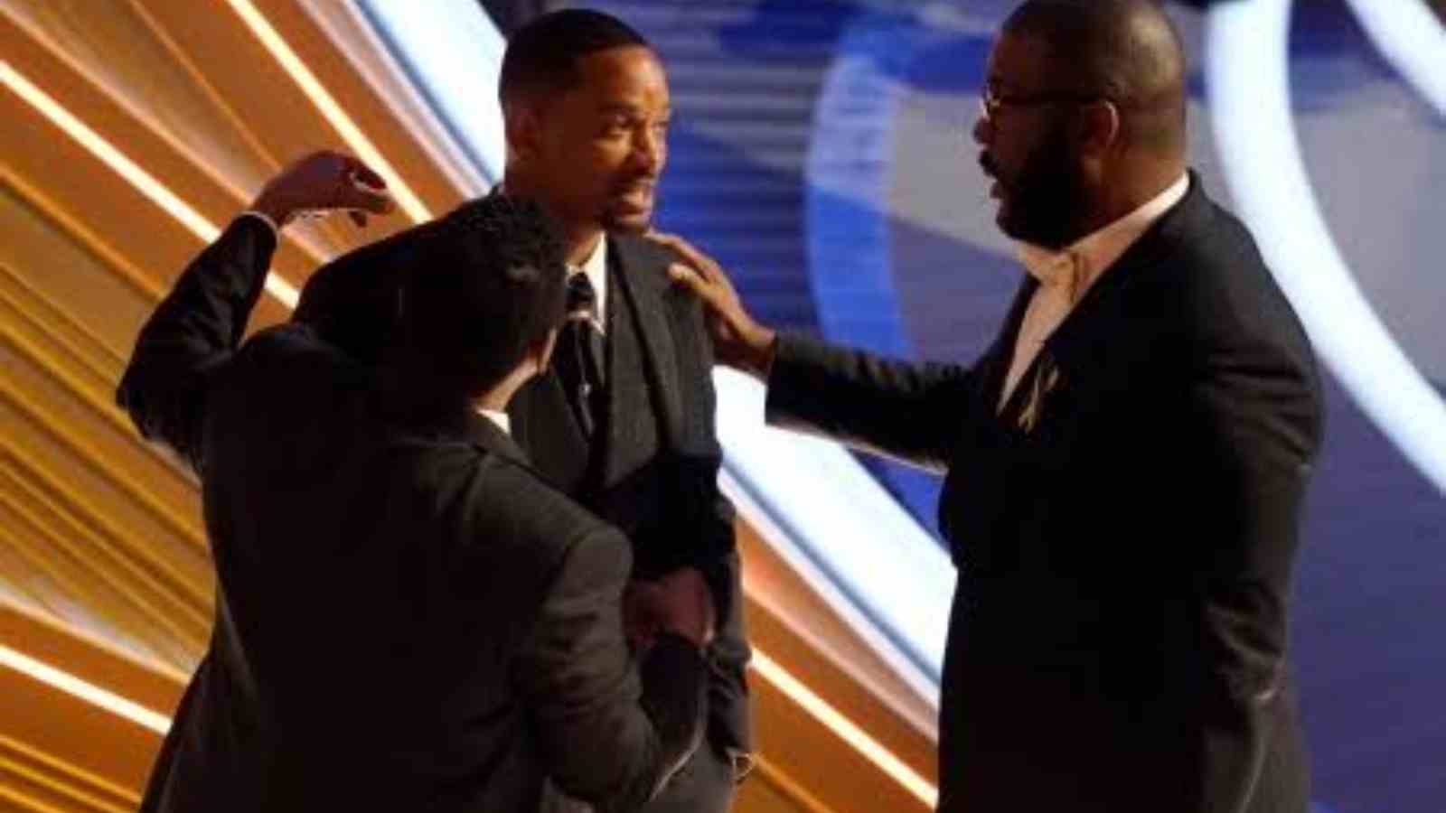 Tyler Perry consoling Will Smith