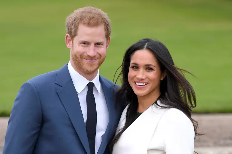 Prince Harry with wife Markle