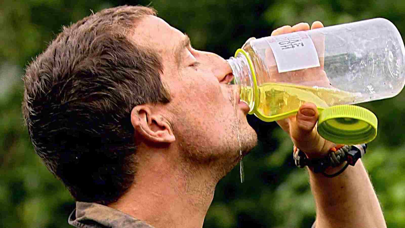 Bear Grylls drinking his urine