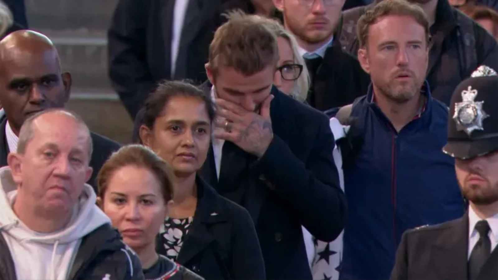 Beckham getting emotional during the funeral