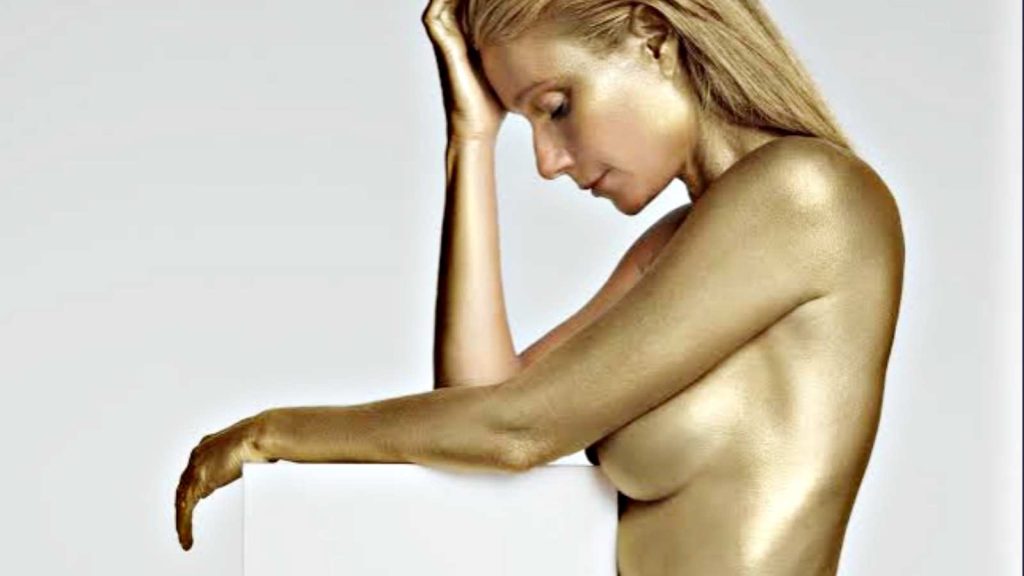 Gwyneth Paltrow poses in gold