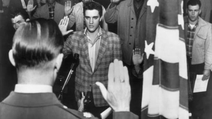 Elvis Presley while taking his oath