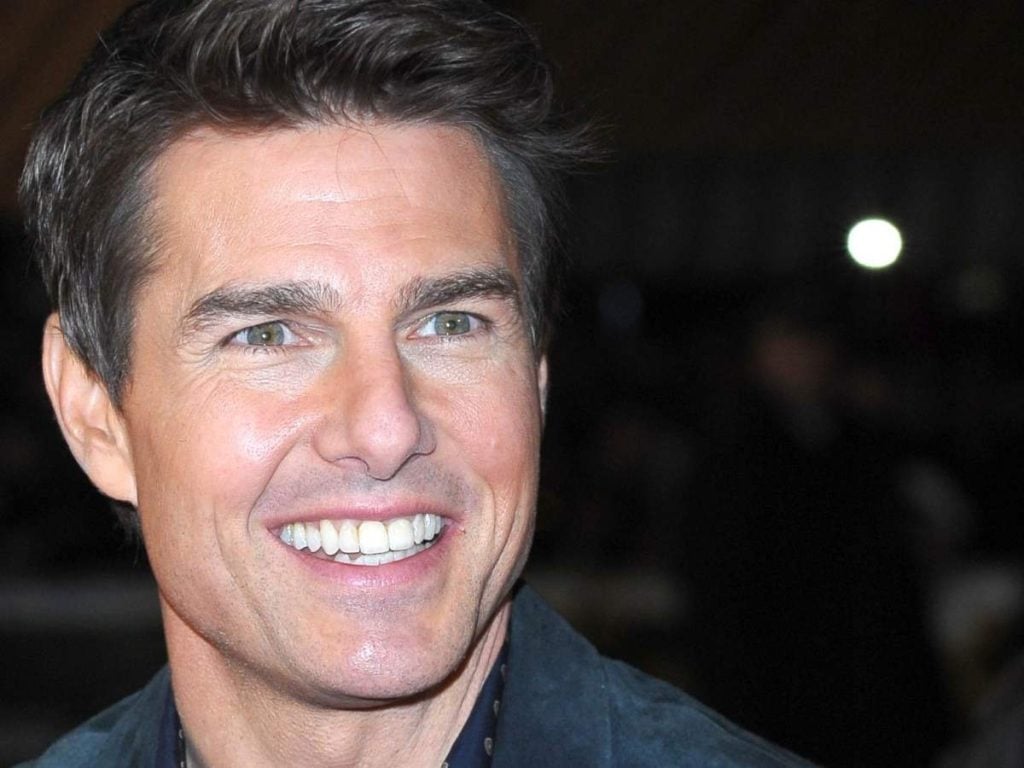 Tom Cruise has perfect teeth now
