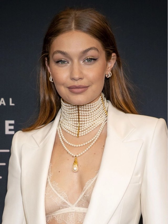 Gigi Hadid Walked the Versace Runway in a Sheer Corseted Gown That Slung  Below Her Butt