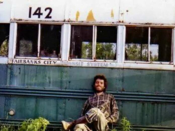 Christopher McCandless next to 'The Magic Bus'