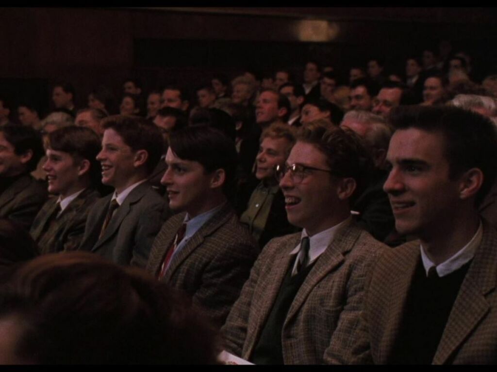 Robin Williams as John Keating inspires his students to find joy outside the classroom