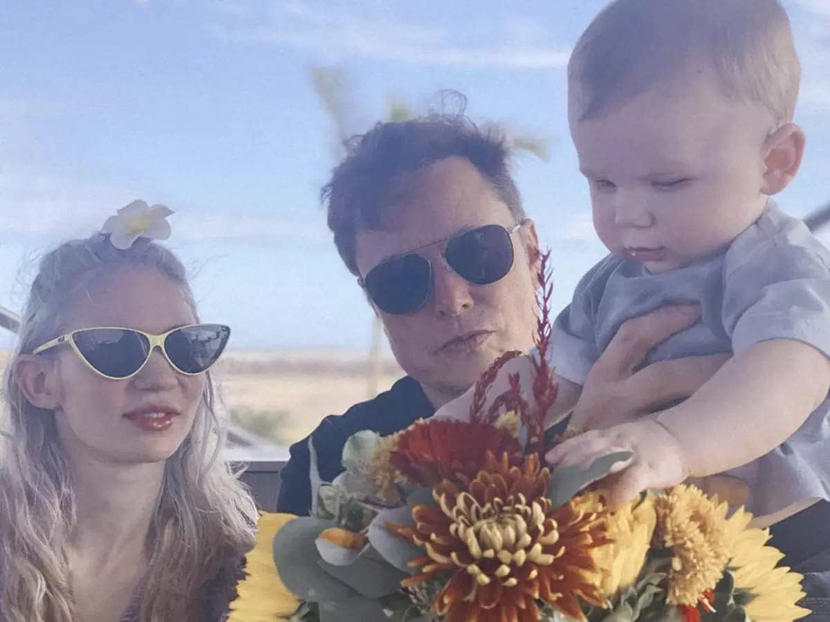 Elon Musk and Grimes with their son