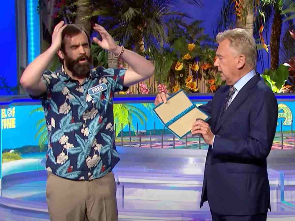 Contestant Fred Jackson with Pat Sajak on Wheel of Fortune