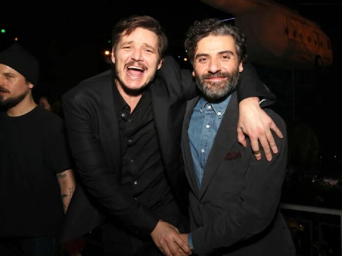Oscar Isaac (right) wants his friend Pedro Pascal to join the 'Spider-Verse' trilogy
