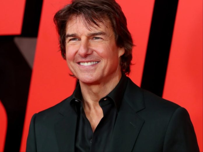 Tom Cruise is often told to stop smiling while shooting dangerous stunts.