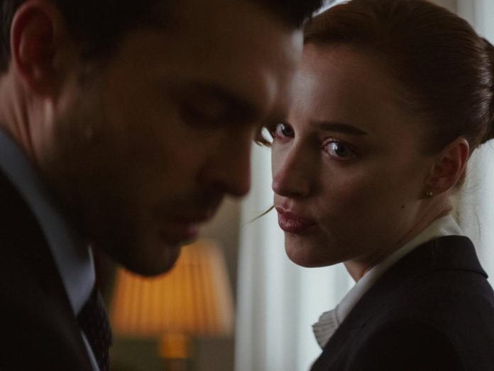 A still from the Netflix film 'Fair Play' with Phoebe Dynevor (right) and Alden Ehrenreich (left.)