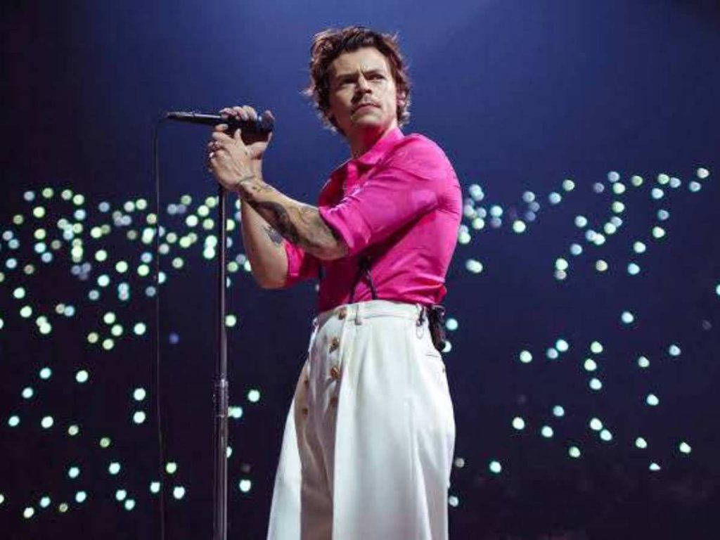 Harry Styles performing on stage 