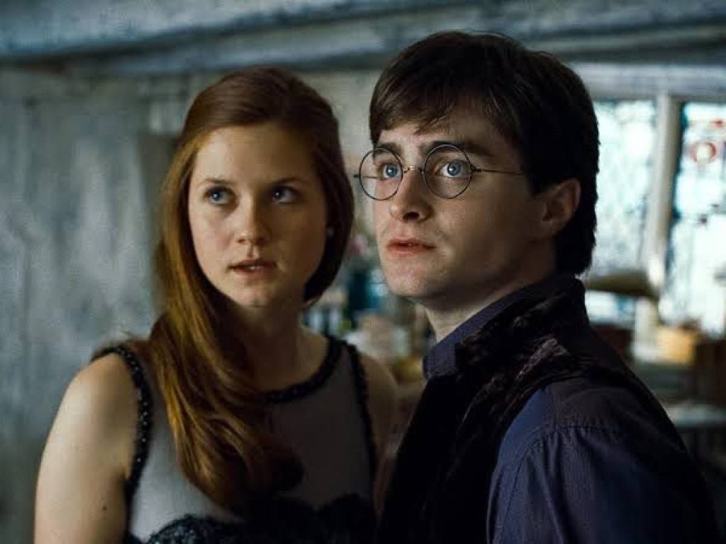 Bonnie Wright as Ginny Weasley and Daniel Radcliff as Harry Potter 