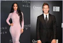 Kim Kardashian and Tom Brady flirt during a charity auction bidding