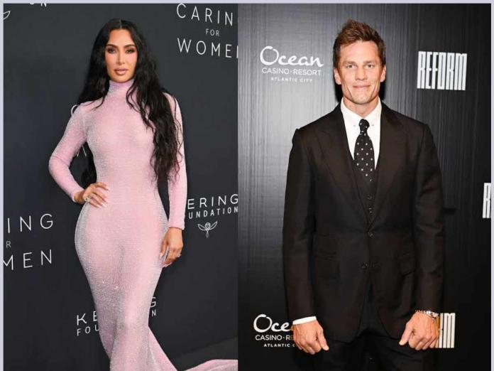 Kim Kardashian and Tom Brady flirt during a charity auction bidding