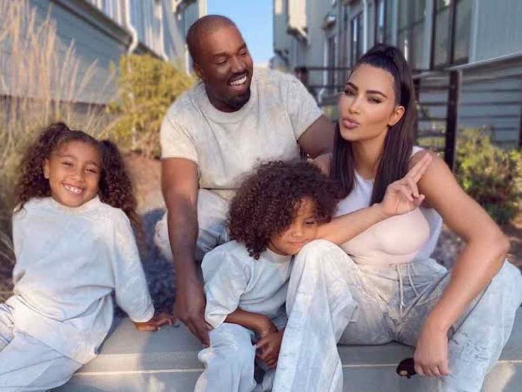 Kim Kardashian and Kanye West with their children (Credit: Getty)