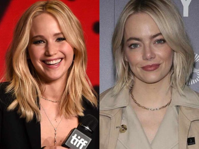 Jennifer Lawrence (left) has her moment before Emma Stone (right) won Best Actress for 'Poor Things'