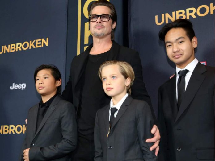 Brad Pitt with his children (Image: Getty)