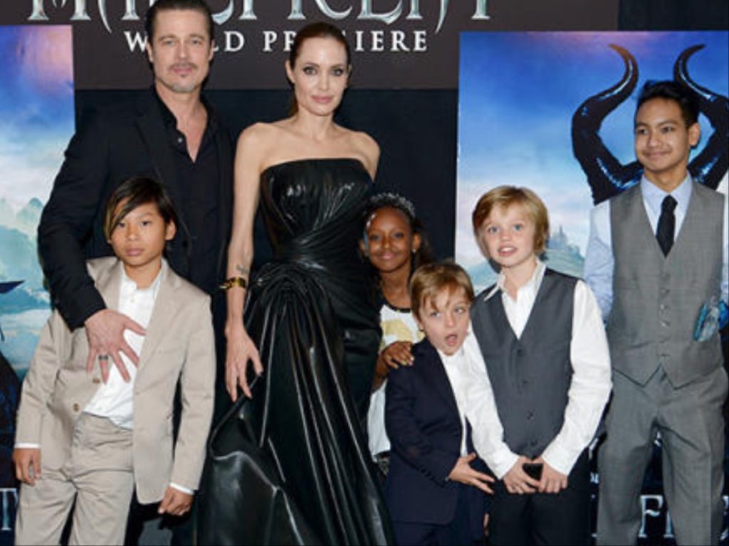 Brad Pitt and Angelina Jolie with their kids (credit: X)