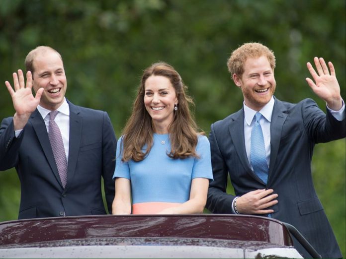 Prince William with his wife Kate Middleton and his brother Prince Harry