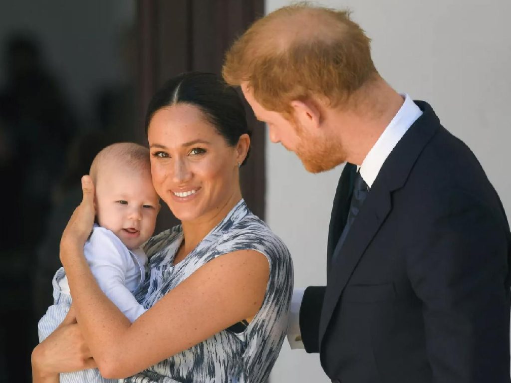 Prince Harry and Meghan Markle with son Archie (Image: Getty)