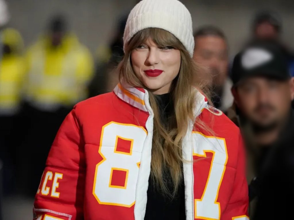 Taylor Swift in custom Travis Kelce jacket