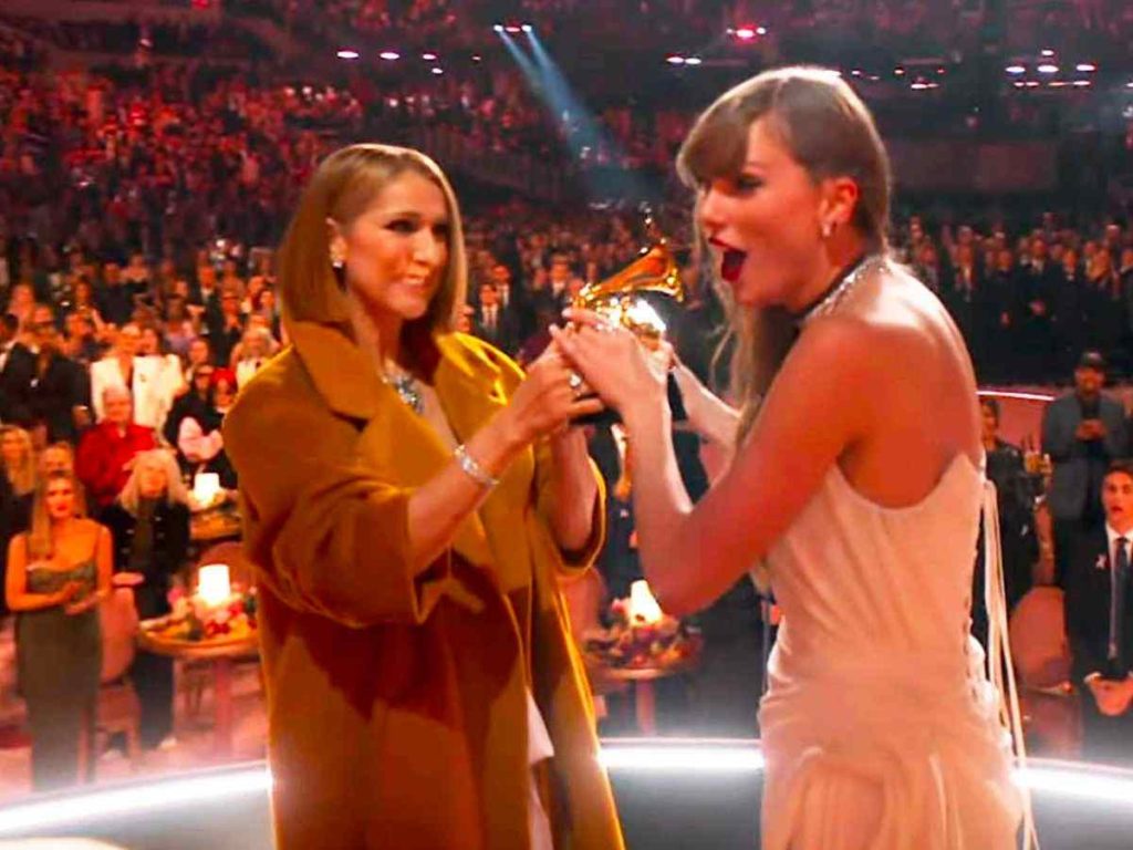 Taylor Swift accepting the award from Celine Dion (Image: Getty)