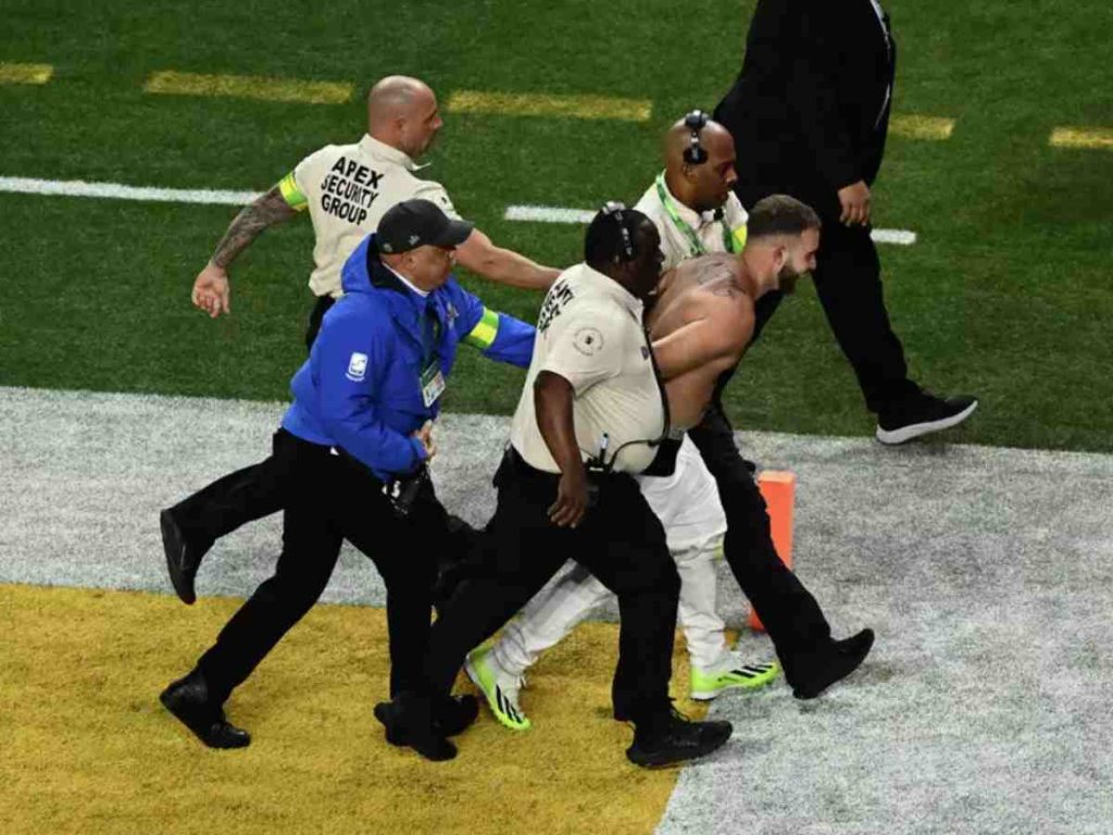 The intruders were caught by security personnel on field (Image: Getty)