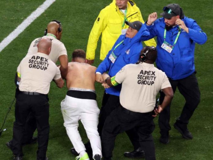 The intruders were caught by security personnel on field (Image: Getty)