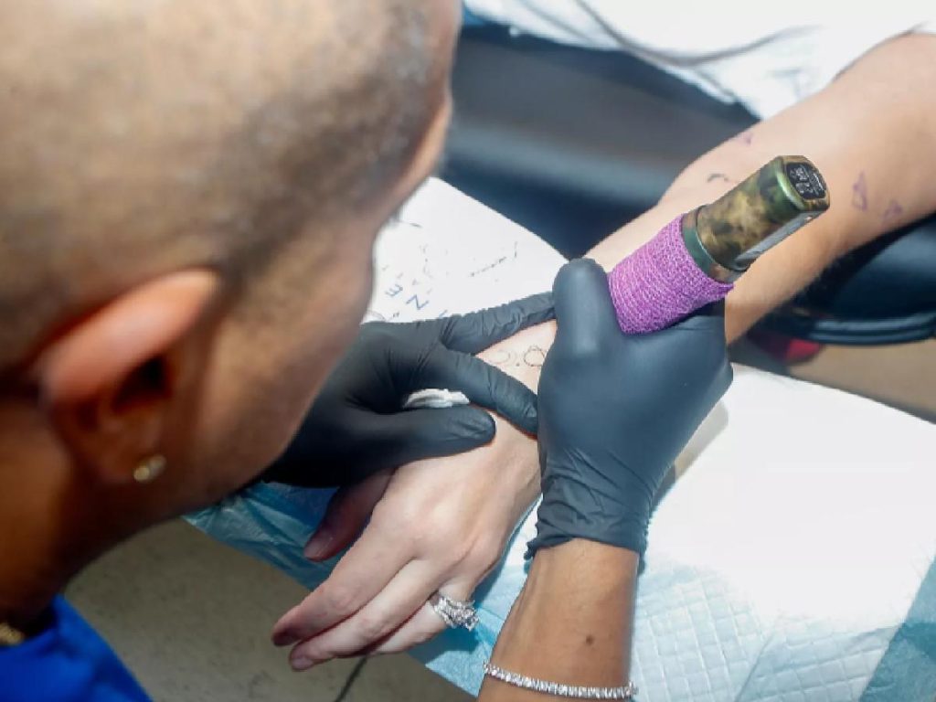 Swifties in Melbourne getting inked (Image: People)