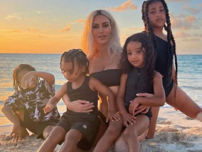 Kim Kardashian with her children (Credit: Getty)