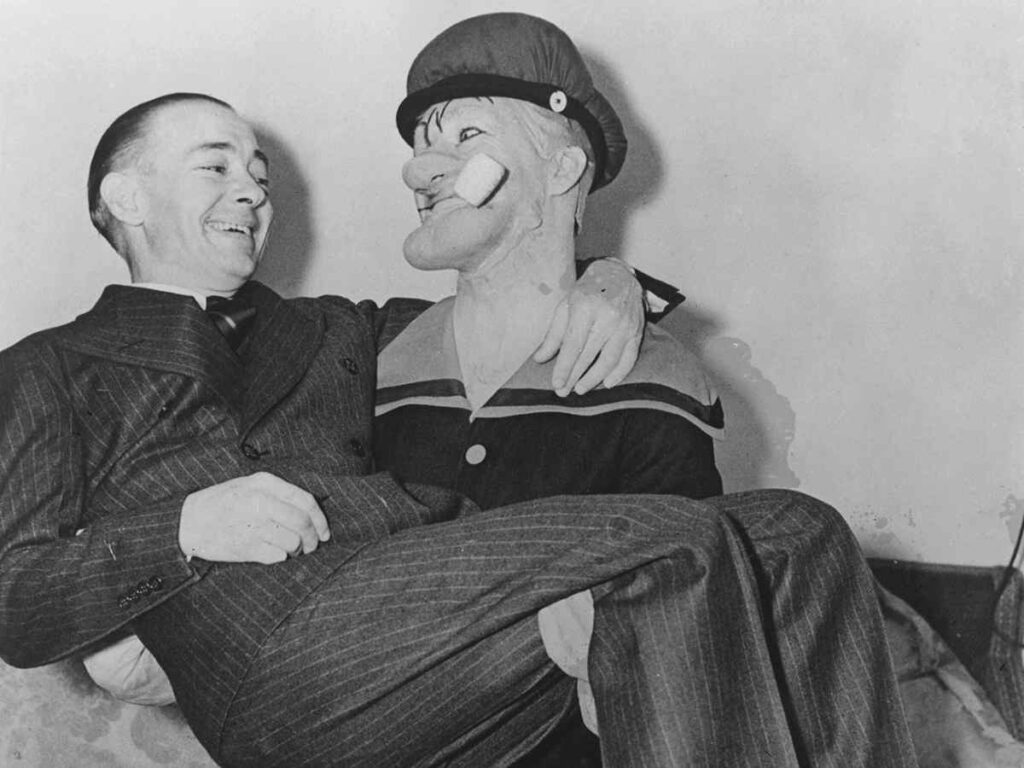 E. C. Segar being carried by actor Harry Foster Welch as sailor Popeye in 1935 (Image: Hulton Archive)