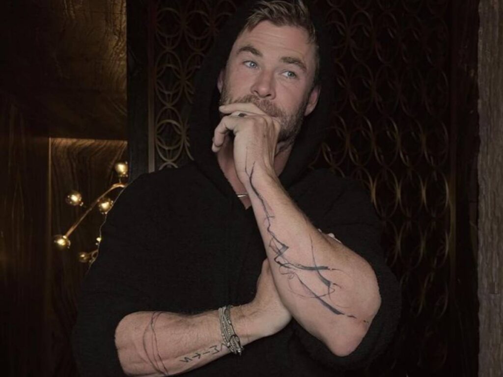 Chris Hemsworth showing off his tattoo (Credit: Instagram)