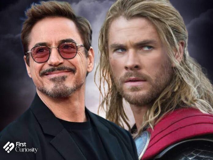 Robert Downey Jr and Chris Hemsworth as Thor