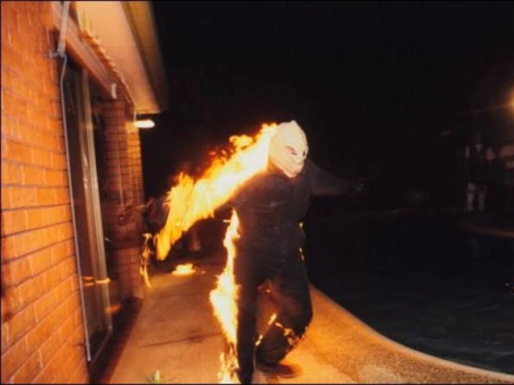 A person setting themselve on fire for The Fire Challenge