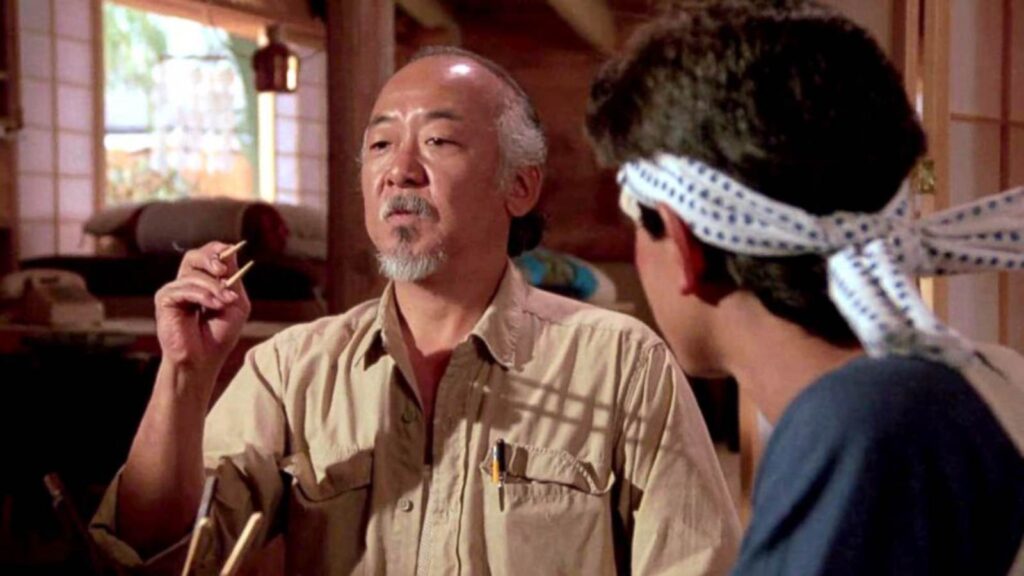 Ralph Macchio as Daniel Larusso and Pat Morita as Mr Miyagi