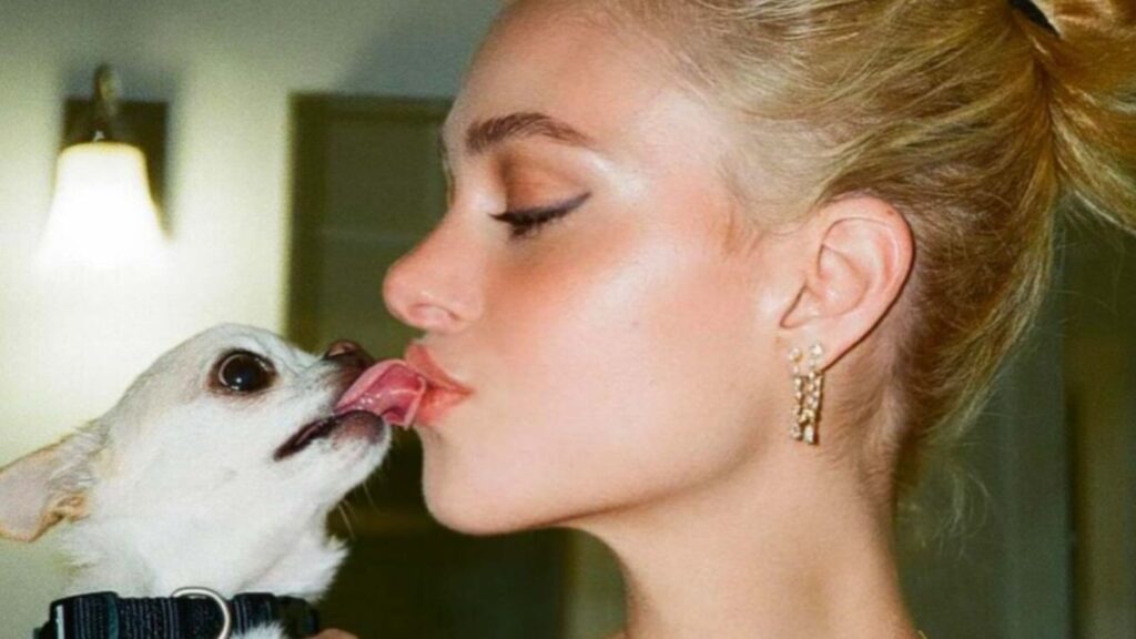 Nicola Peltz and Nala (Image: Instagram /@nicolapeltzbeckham)