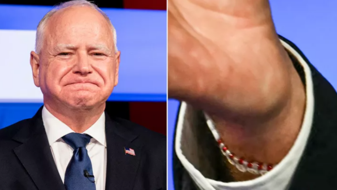 Tim Walz with a pink friendship bracelet (Image: AFP)