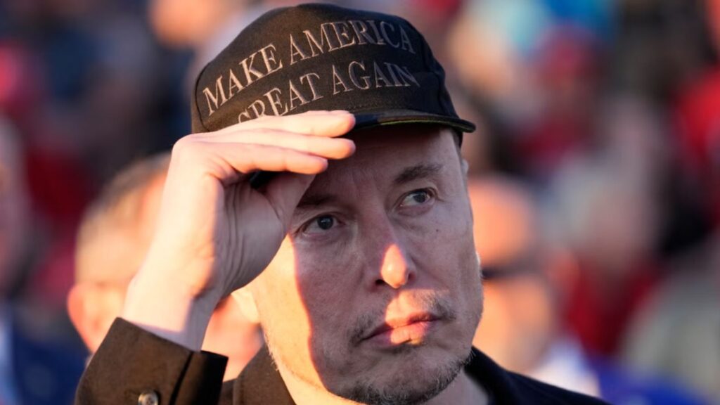 Elon Musk with the MAGA cap (Image: Reuters)