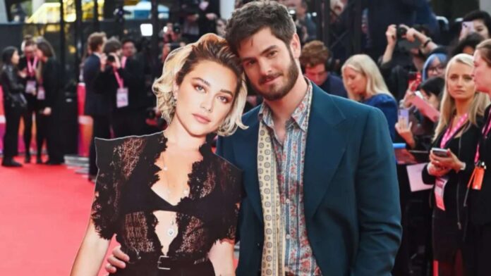 Andrew Garfield with Florence Pugh's cutout (Image: X)