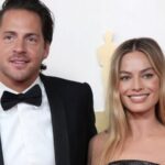 Tom Ackerley and Margot Robbie (Image: AP)