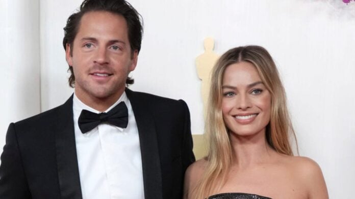 Tom Ackerley and Margot Robbie (Image: AP)