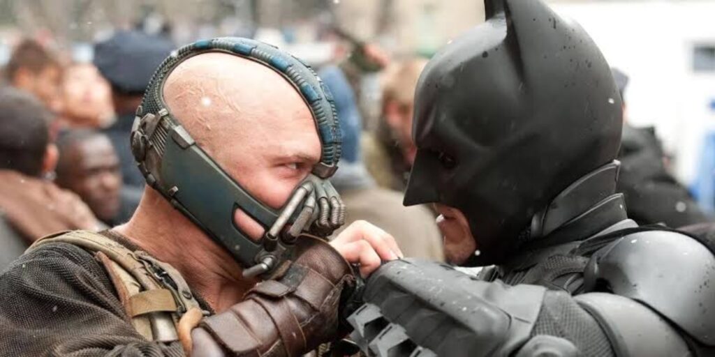 Bane and Batman in 'The Dark Knight' Trilogy (Image: Warner Bros)