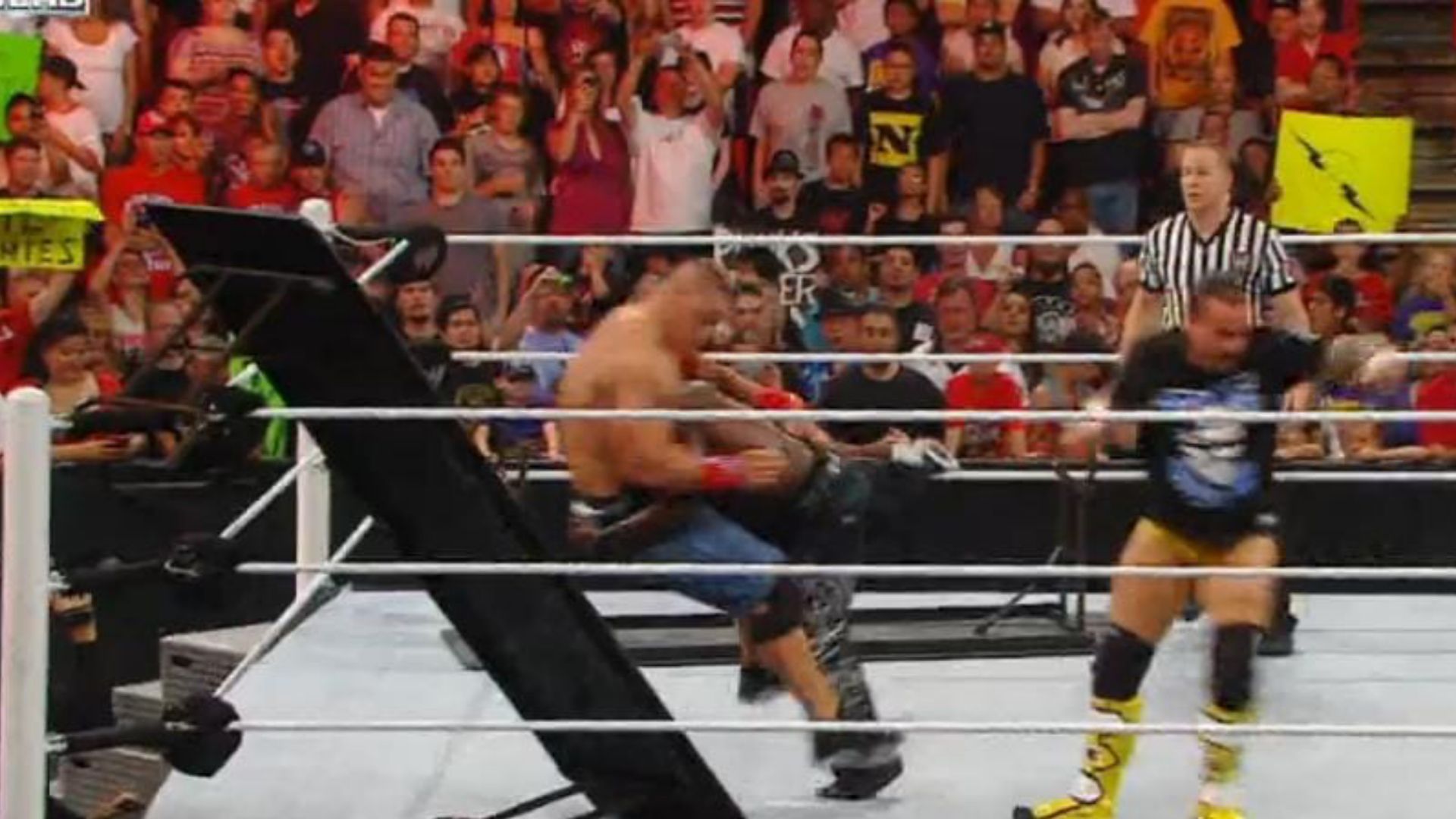 13. R-Truth spears John Cena through the table (Raw June 27, 2011)