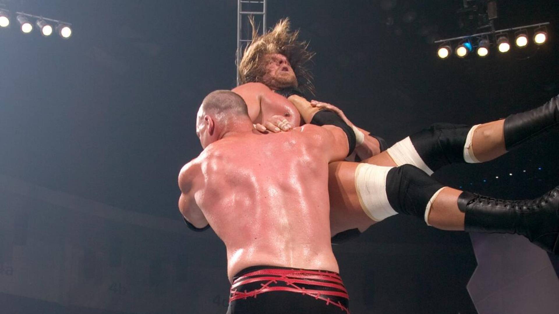 14- Kane’s Chokeslam