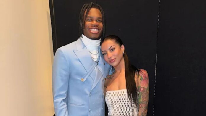 Travis Hunter and his wife