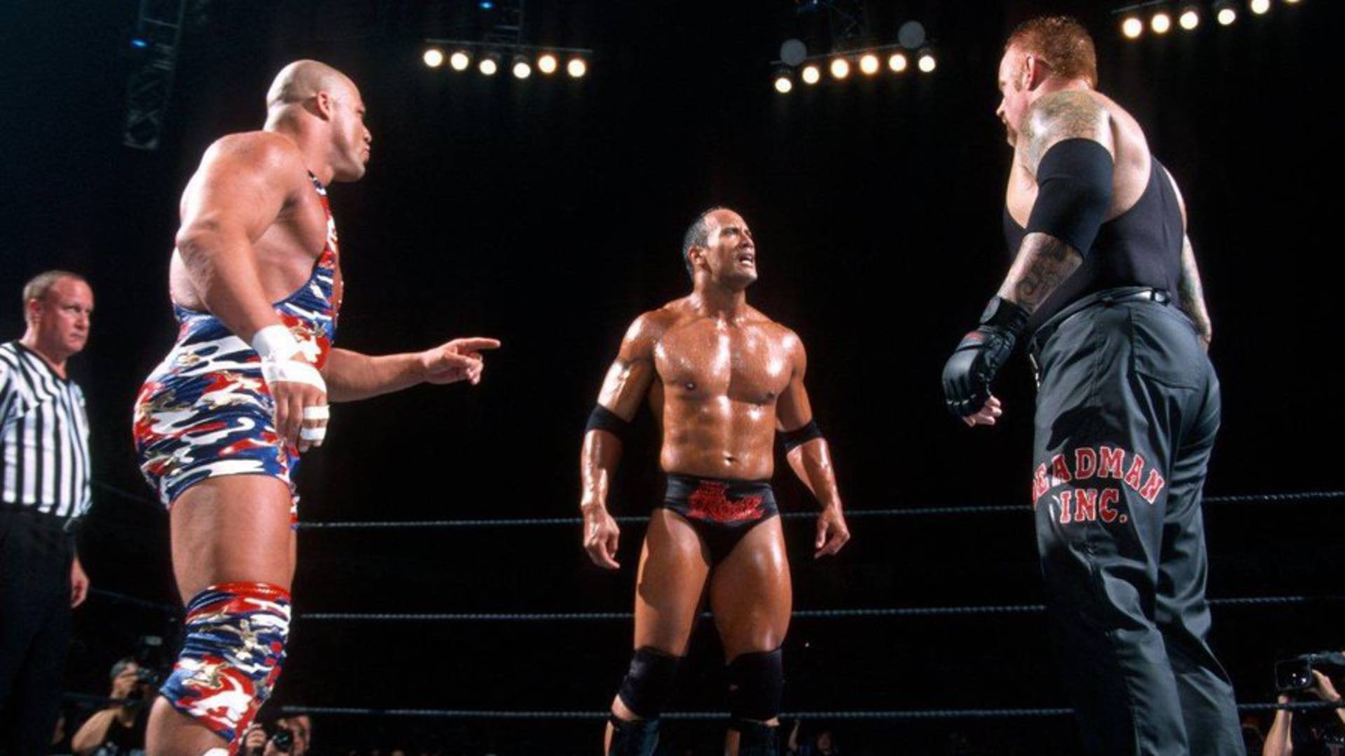 9- The Undertaker vs. The Rock vs. Kurt Angle - Vengeance 2002